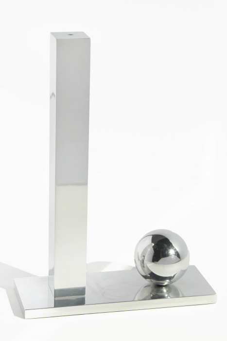 Small, thin aluminum platform below an aluminum tower on the left side and an aluminum sphere on right side.