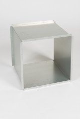 A metal cube with the front and back faces removed, creating a square tube.