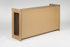 A brown industrial cardboard rectangular tube segment sitting on its short faced long side.