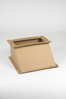 A brown industrial cardboard trapezoidal square tube transition piece segment.